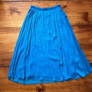 Pleated A-line midi skirt by Anthropologie